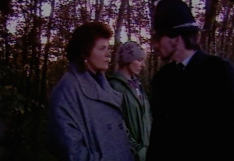 Fence cutting at Greenham Common, film still from “Can’t Beat It Alone, Part IV,” 1985.